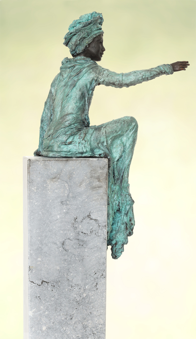 Bronze statue with turquoise patina: a seated woman in robes extends her right arm, mounted on a tall rectangular pedestal.